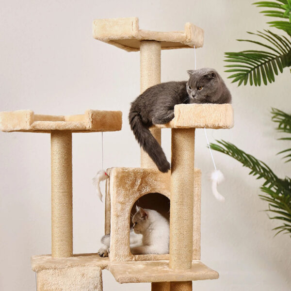 Beige multi-level cat tree with scratching posts, enclosed hideaways, dangling toys, and a stable base