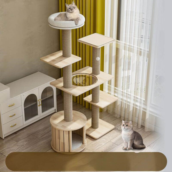 Modern beige cat tree tower with scratching posts, plush platforms, a hideaway, and a hanging toy ball in a stylish living room with yellow curtains and light wood flooring